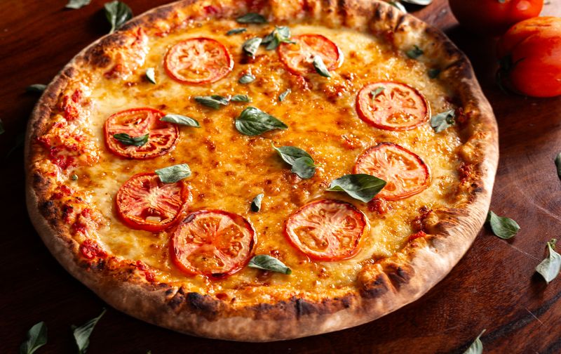 Pizza luce team working together in our St Paul restaurant kitchen