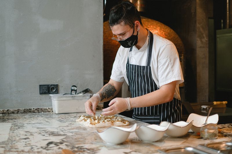 Pizza luce restaurant kitchen with fresh pizza preparation